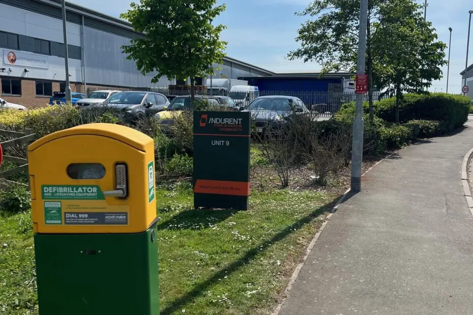 Lamppost on Boundary Road behind defibrillator / opposite entrance to EVRY warehouse