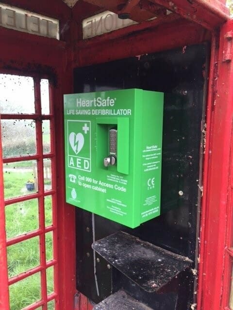HeartSafe Samaritan PAD Defibrillator Cabinet inside a telephone box