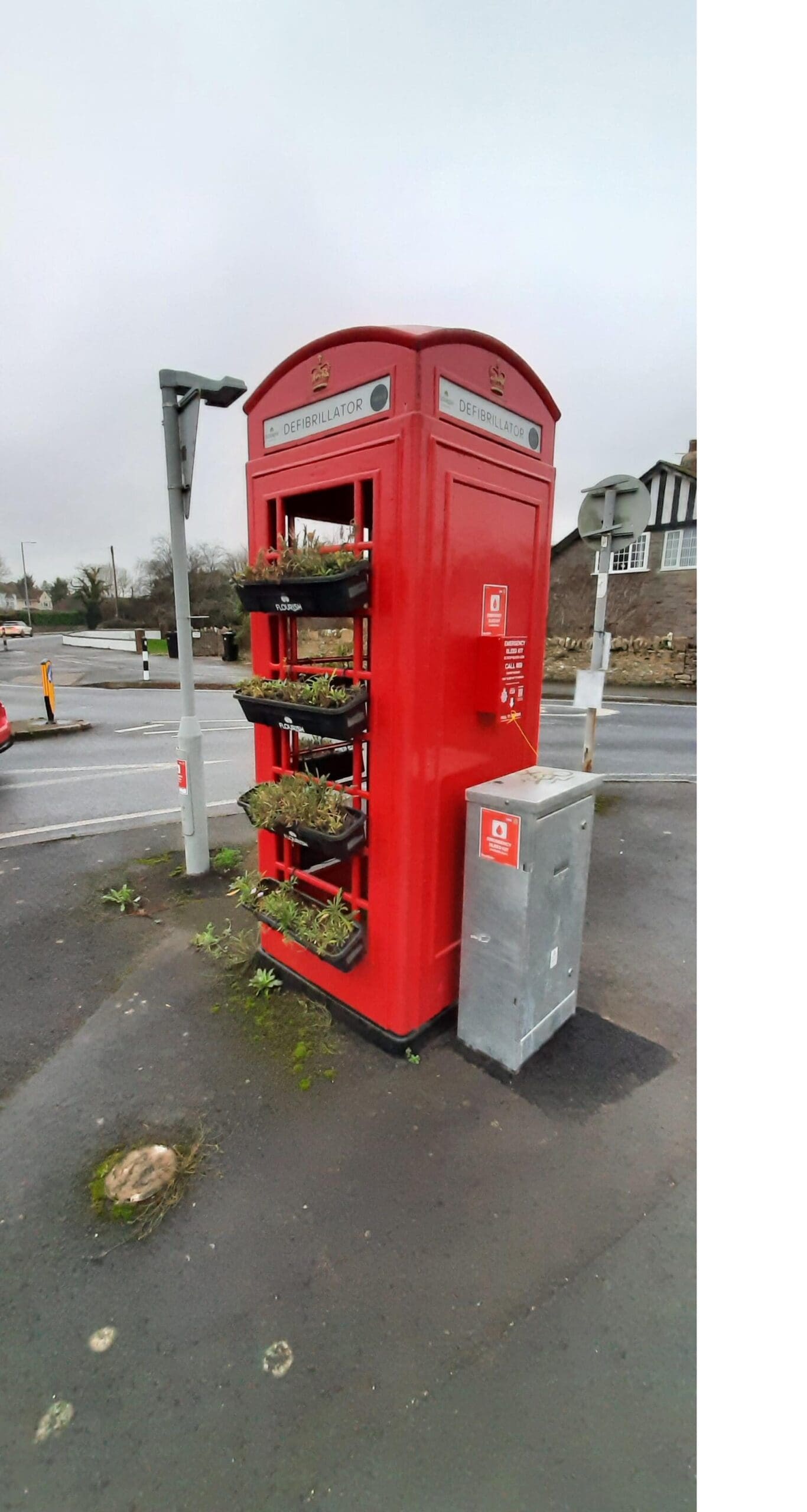 Red phone box located on Norman Road nr junction with A4 Bath Rd